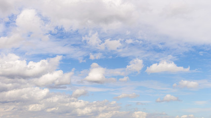 Blue sky with clouds background