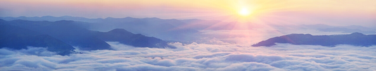 Dawn above the sea of fog