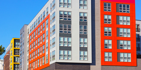 New residential buildings in suburban Virginia, USA. Geometry of colorful modern residential buildings.