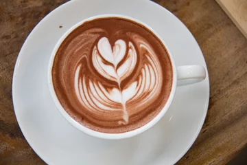Photo sur Plexiglas Chocolat Hot Chocolate art on the wooden table.