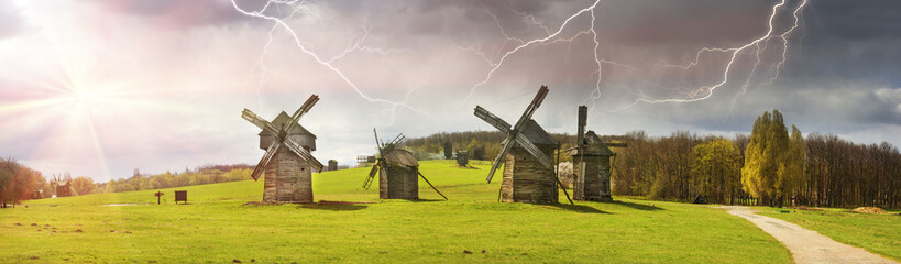 Fototapeta na wymiar The storm over windmills