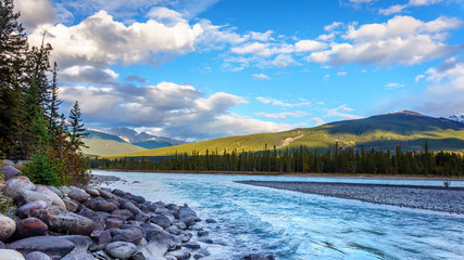 Sunrise over the mountains around the town of Jasper in the Canadian Rocky Mountains on a nice...