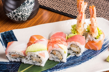 delicious sushi rolls on a plate in a japanese restaurant