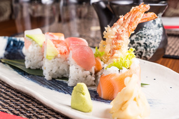 delicious sushi rolls on a plate in a japanese restaurant