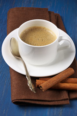 Cup of coffee with cinnamon