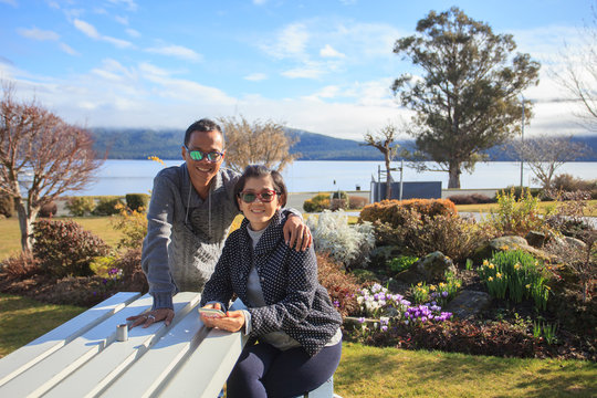 thai people take a photograph with happiness emotion at te anau