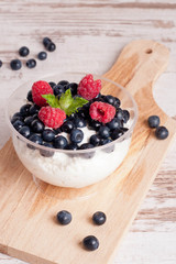 homemade fresh yogurt with blueberries and raspberries. Healthy