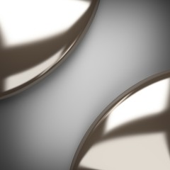 polished metal element on gray background