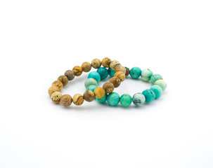 turquoise and brown bracelet stone on white background