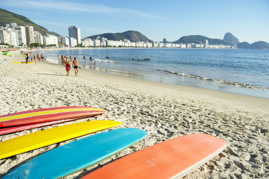 Stand up paddle long board surfboards on Copacabana Beach Rio de Janeiro Brazil