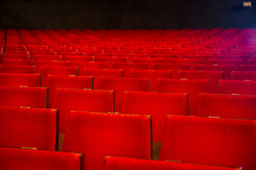 Rows of chairs in old style cinema hall