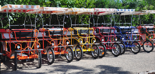 Fototapeta na wymiar fourseater bikes for rent