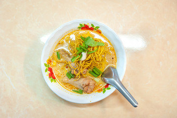 Chiang Mai speciality crispy noodles with chicken - khao soi gai