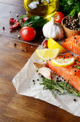 Raw salmon on baking paper