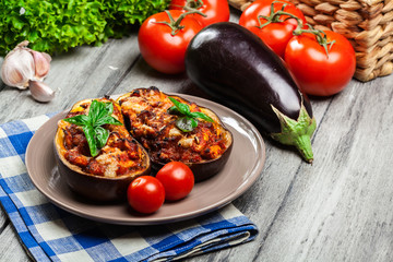 Baked eggplant with pieces of chicken