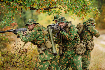 Russian special forces operator in the battlefield with a rifle