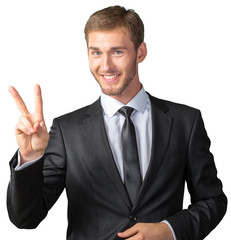 Businessman showing victory sign