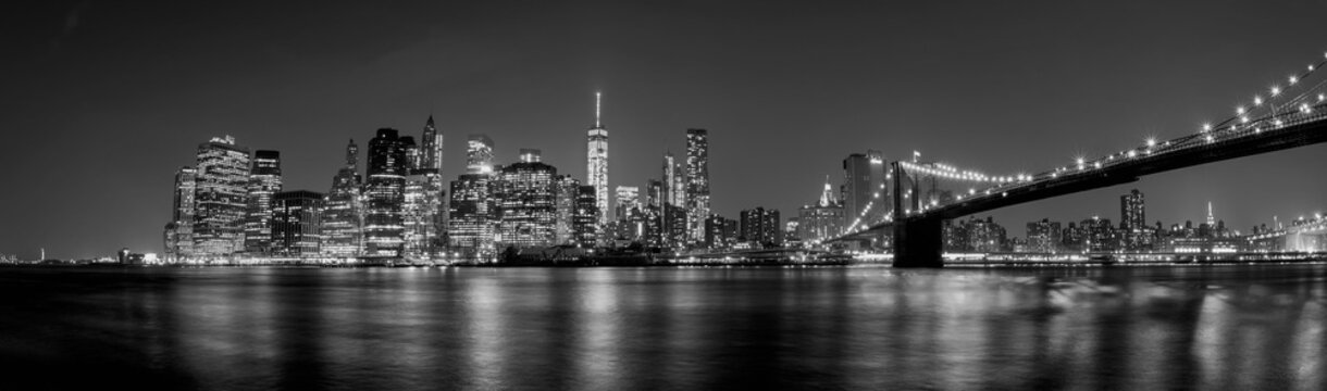 manhattan night view from brooklyn in black and white
