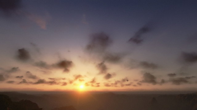 Couple on top of the mountain, timelapse sunset, tilt