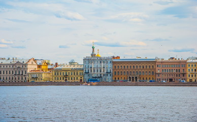 Embankment of the Neva River with beautiful old houses in St. Petersburg