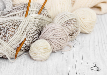 Fototapeta na wymiar Skeins of wool and knitting needles