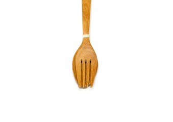 Spoon and fork made of wood on white background