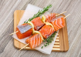 Raw salmon skewers