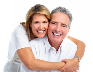 Happy laughing elderly couple.