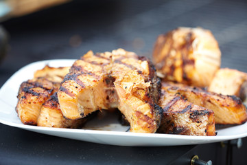 Salmon fish roast on barbecue grill.
