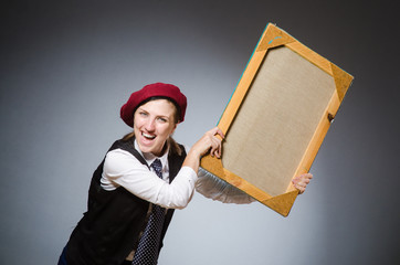 Funny artist working in the studio