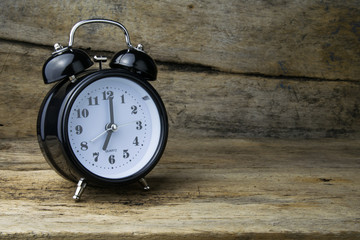 Morning alarm clock on table