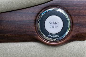 Engine start stop button from a modern car interior