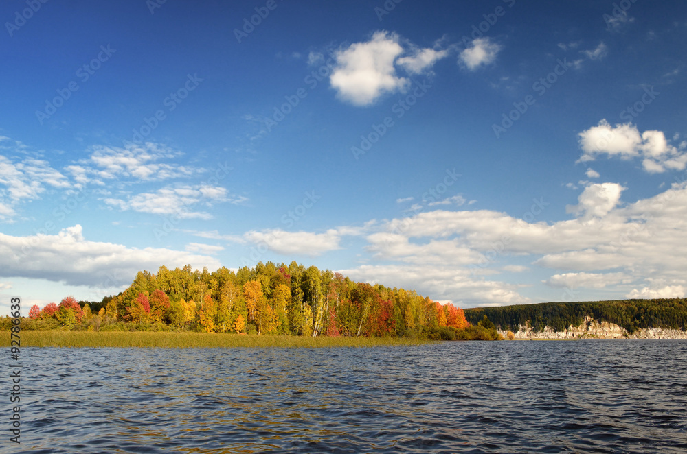 Wall mural Landscape colorful autumn forest lake river sky clouds