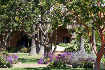 Restored garden inside historic Mission San Juan Capistrano in California