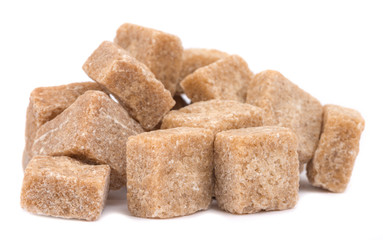 cubes of sugar cane brown isolated on white background