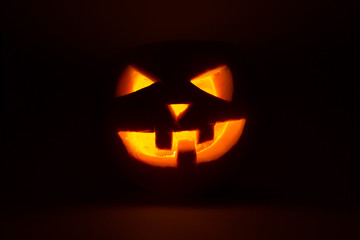 halloween pumpkin jack  lantern on dark