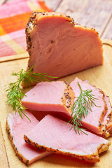 beef fried with spices cut on plates with greens
