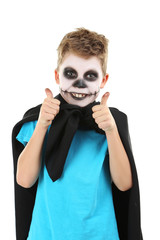 Little boy in halloween costume on white background