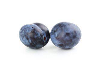 Fresh plums isolated on a white