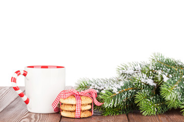 Christmas tree branch, cookies and mulled wine cup