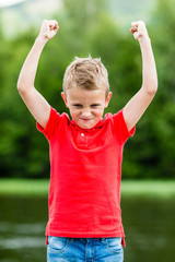 Kid with raised hands