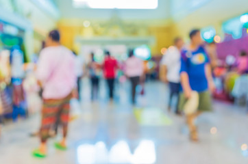 blurred image of people at shopping mall