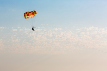People parasailing over the sea