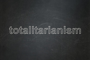 Obraz premium Political concept: Totalitarianism on chalkboard background