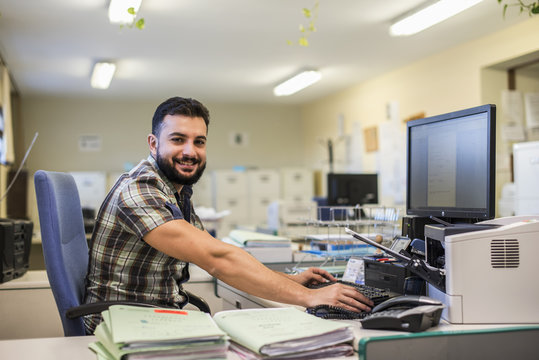 30s Young Hipster Man Style Working At Office With Ambient Light