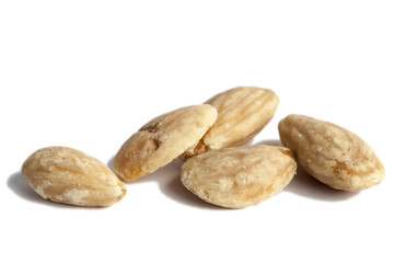 Peeled almonds isolated on white.