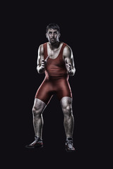 Fototapeta na wymiar Freestyle wrestler in red uniform 