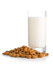 Glass of almond milk with almonds