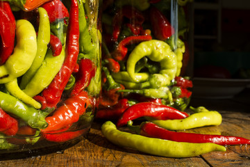 Traditional Jarred yellow, green, red, hot peppers. High resolution image.