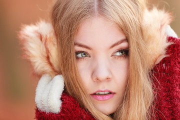 Portrait of pretty gorgeous woman in earmuffs.